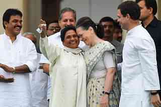 Mayawati, left, with Sonia and Rahul Gandhi. (Arijit Sen/Hindustan Times via GettyImages)