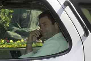Rahul Gandhi talking on a phone in 2013 (Sonu Mehta/Hindustan Times via Getty Images)