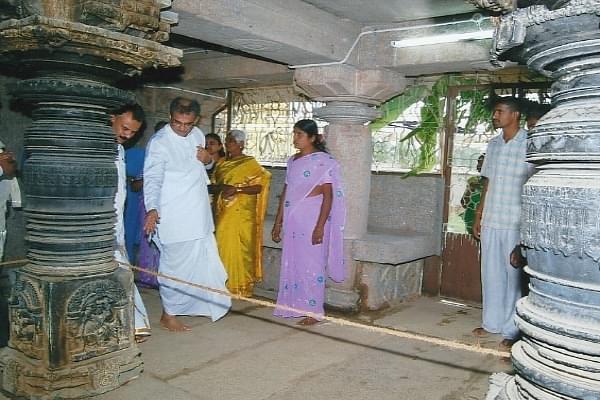 Dr Veerendra Heggade monitoring work at one of the restored temples.