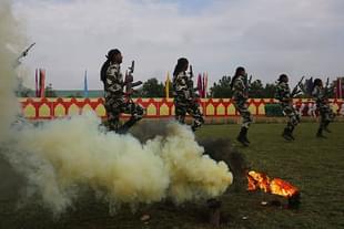 New recruits of the CRPF perform drills during the passing out parade on 14 May 2015 in Humhama, on the outskirts of Srinagar, India. (Waseem Andrabi/Hindustan Times via GettyImages)