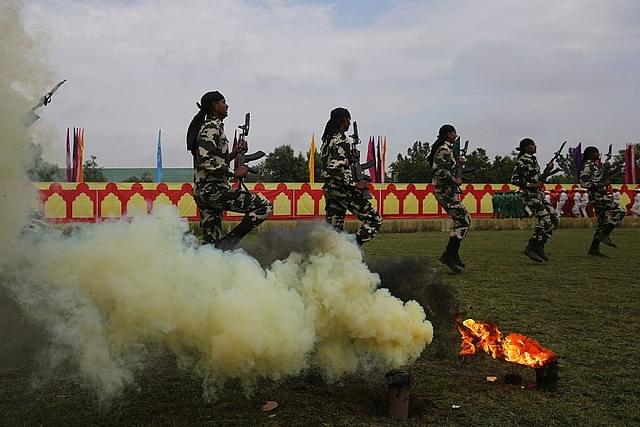 New recruits of the CRPF perform drills during the passing out parade on 14 May  2015 in Humhama, on the outskirts of Srinagar, India. (Waseem Andrabi/Hindustan Times via GettyImages)