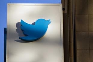 The Twitter Inc. logo is displayed on the facade of the company’s headquarters in San Francisco. (David Paul Morris/Bloomberg via Getty Images) 