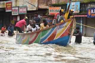 Local fishermen and volunteers rescue people in Kerala (Raj K Raj/Hindustan Times via Getty Images)