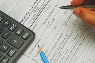 Income Tax return forms
(NOAH SEELAM/AFP/GettyImages)