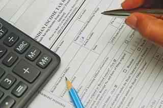 Income Tax return forms
(NOAH SEELAM/AFP/GettyImages)

