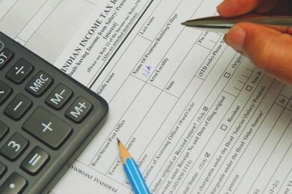 Income Tax return forms
(NOAH SEELAM/AFP/GettyImages)