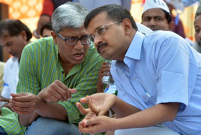 Ashutosh with Arvind Kejriwal. (K.Asif/India Today Group/Getty Images)