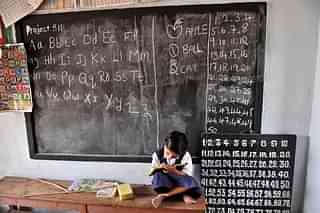 A child in a classroom.&nbsp;