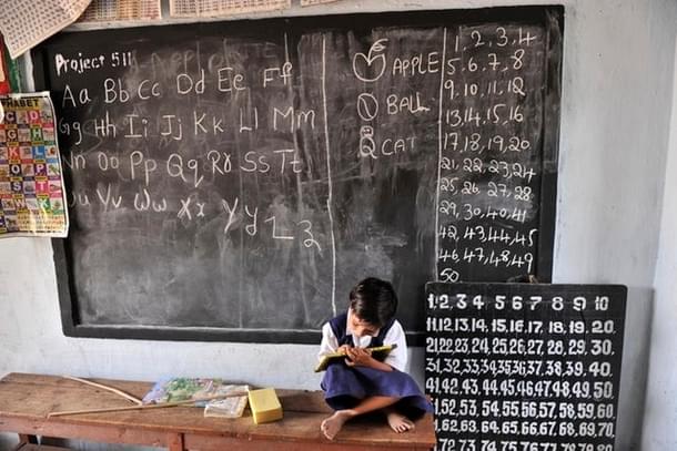 A child in a classroom. 