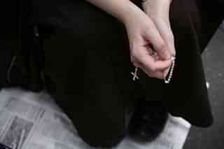 Nun holding a christian cross - Representative Image (Alex Wong/Getty Images)
