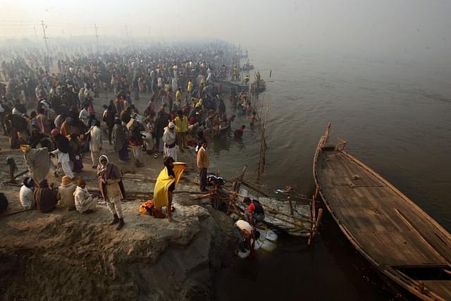 Hindu pilgrims gather to bathe at the ritual bathing site at Sangam, during the Kumbh Mela festival in Allahabad, India. (Mario Tama/Getty Images)