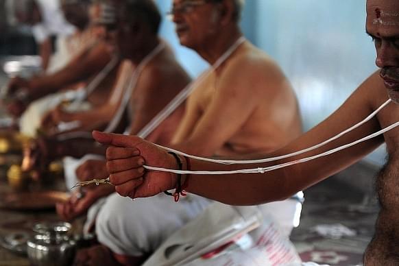 Brahmin community members perform a ritual in Chennai. (ARUN SANKAR/AFP/GettyImages)