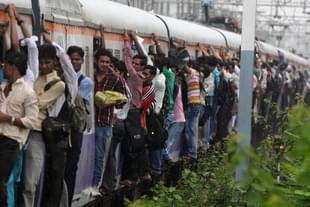 Crowded Local Train in Mumbai  (Photo by Sattish Bate/Hindustan Times via Getty Images)