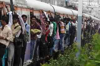 Crowded Local Train in Mumbai&nbsp; (Photo by Sattish Bate/Hindustan Times via Getty Images)