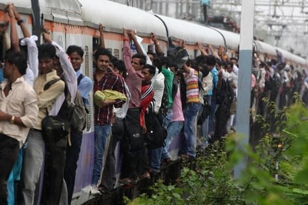 Crowded Local Train in Mumbai  (Photo by Sattish Bate/Hindustan Times via Getty Images)