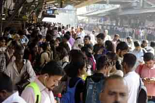 People waiting for train (Rishikesh Choudhary/Hindustan Times via Getty Images)
