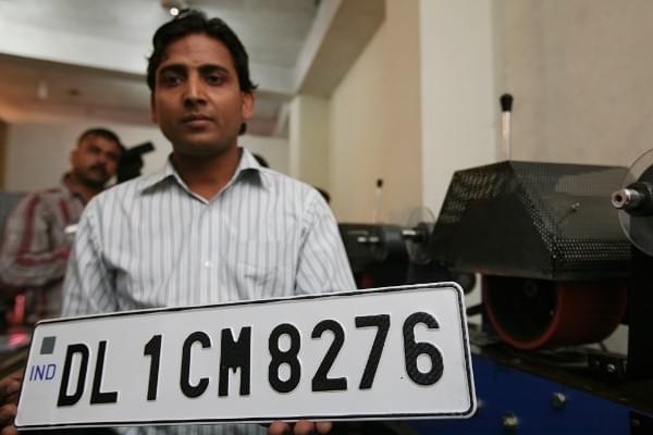 An example of a high-security number plate, which will be made mandatory in every vehicle in New Delhi. (Photo by Ramesh Sharma/India Today Group/Getty Images) 