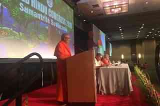 Swami Paramatmananda, Secretary General of the Hindu Dharma Acharya Sabha, addresses the plenary session of the World Hindu Congress in Chicago, United States. (@WHCongress/Twitter)