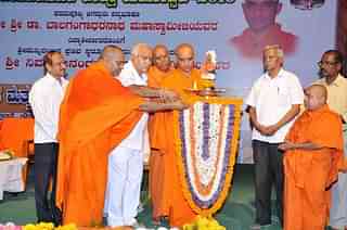 Adichunchanagiri seer Nirmalananda with BJP leader Yeddyurappa. 