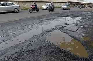 Potholes on Indian roads. (representative image). (Satyabrata Tripathy /Hindustan Times via Getty Images)