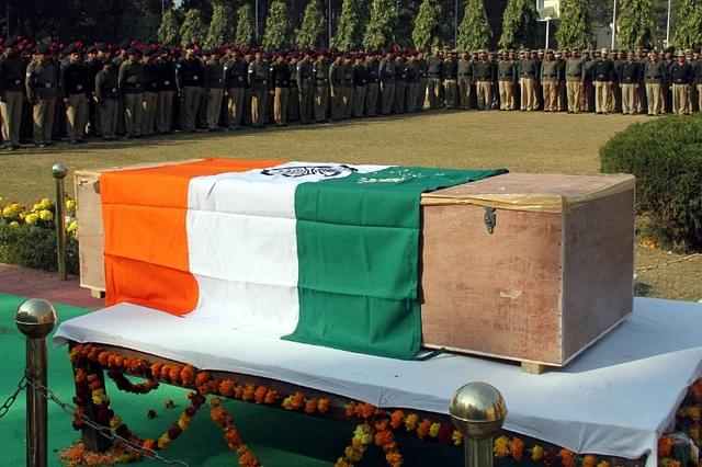 BSF soldiers stands near the coffin of Ram Gawaria (Representative Image/Nitin Kanotra/Hindustan Times via Getty Images)&nbsp;
