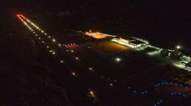 The runway and the terminal building at night. (Airports Authority of India)  