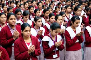 Girls participating in morning prayer meeting at Sarvodaya Kanya Vidyalaya. (Representative Image/Priyanka Parashar/Hindustan Times via Getty Images) 