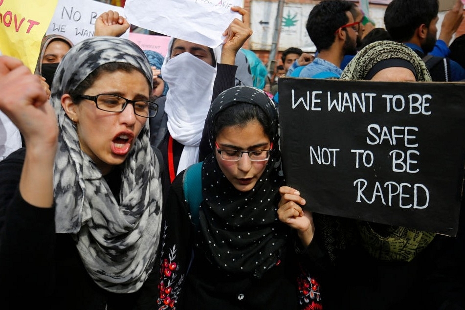 Students of Central University of Kashmir (CUK) shout slogans against the rape of an eight-year-old girl on 16 April 2018 in Srinagar. (Photo by Waseem Andrabi/Hindustan Times via Getty Images)