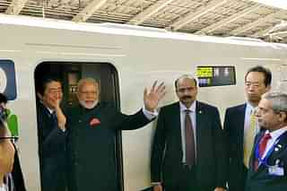 PM Modi with Japanese PM Shinzo Abe during a Shinkasen Bullet train journey. (pic via Twitter)