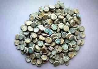 The coins found during the excavation. (picture via PIB)