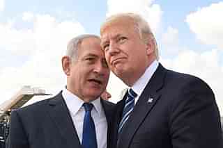 Israeli Prime Minister Benjamin Netanyahu speaks with US President Donald Trump. (Kobi Gideon/GPO via Getty Images)