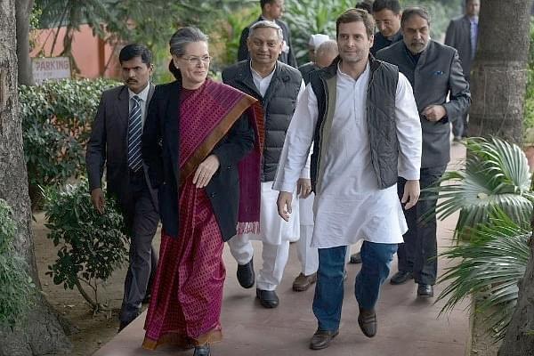 Sonia Gandhi with son and Congress president Rahul Gandhi at the party office in New Delhi. (Photo by Pankaj Nangia/India Today Group/Getty Images)