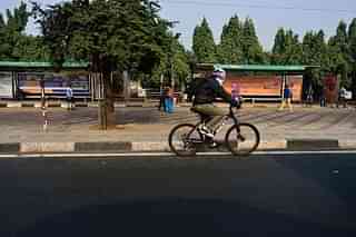 Man cycling in Delhi (Priyanka Parashar/Mint via Getty Images)&nbsp;
