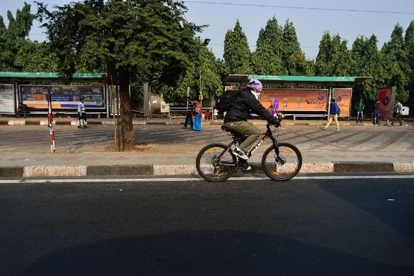 Man cycling in Delhi (Priyanka Parashar/Mint via Getty Images) 