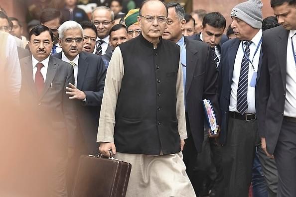 Finance Minister Arun Jaitley (C) leaves his office for the General Budget (Photo by Raj K Raj/Hindustan Times via Getty Images)