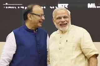 Corporate Affairs Minister Arun Jaitley with Prime Minister Narendra Modi (Vipin Kumar/Hindustan Times via Getty Images)