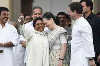 Mayawati with Sonia and Rahul Gandhis. (Arijit Sen/Hindustan Times via Getty Images)