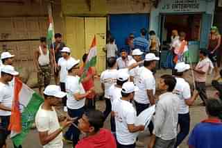 Congress workers staging a protest in Guwahati (pic via Twitter)