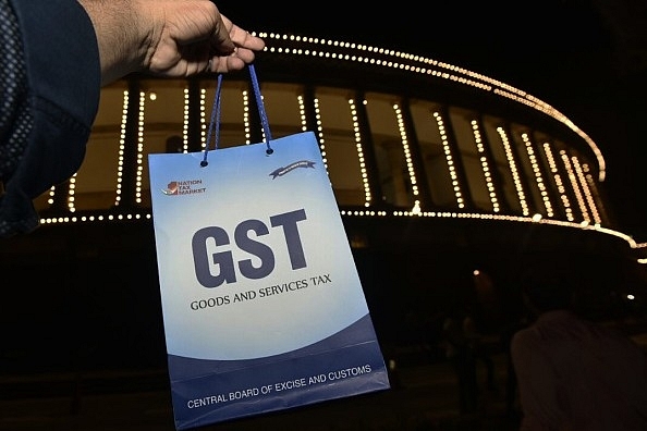 GST is the new goods and services tax regime in India. (photo by Arun Sharma/Hindustan Times via Getty Images)