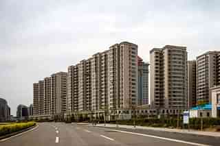 Chinese ghost cities are a by-product of the construction boom. (pic via Twitter)