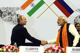Indian Prime Minister Narendra Modi shaking hand with Russian President Vladimir Putin (Sushil Kumar/Hindustan Times via GettyImages)