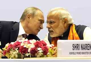 Indian Prime Minister Narendra Modi talking with Russian President Vladimir Putin. (Sushil Kumar/Hindustan Times via Getty Images)&nbsp;
