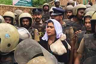 Kerala police accompanying activist Rehana Fathima in Sabarimala (@ANI/Twitter)