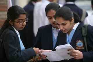 Grade XII students rivising in the last minute outside their examination centres. (Representative image) (Shekhar Yadav/India Today Group/Getty Images)