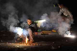 Children in Delhi burst crackers during Diwali. (Vipin Kumar/Hindustan Times via GettyImages)&nbsp;
