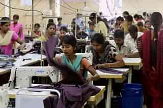 Women at a garments factory. (Manjunath Kiran/AFP/Getty Images)