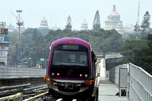 The Namma Metro in Bengaluru, with the Vidhan Soudha in backdrop. 