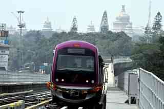 The Namma Metro in Bengaluru, with the Vidhan Soudha in backdrop.&nbsp;