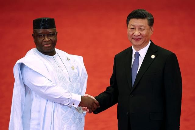 Sierra Leone President Julius Maada Bio (L) with Chinese President Xi Jinping (R)&nbsp;