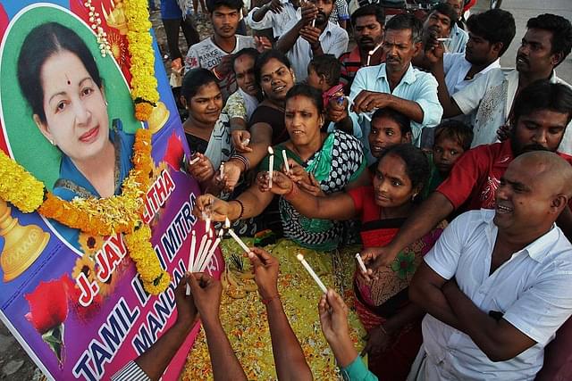 People paying tribute to the then Tamil Nadu chief minister J Jayalalithaa. (Praful Gangurde/Hindustan Times via Getty Images)